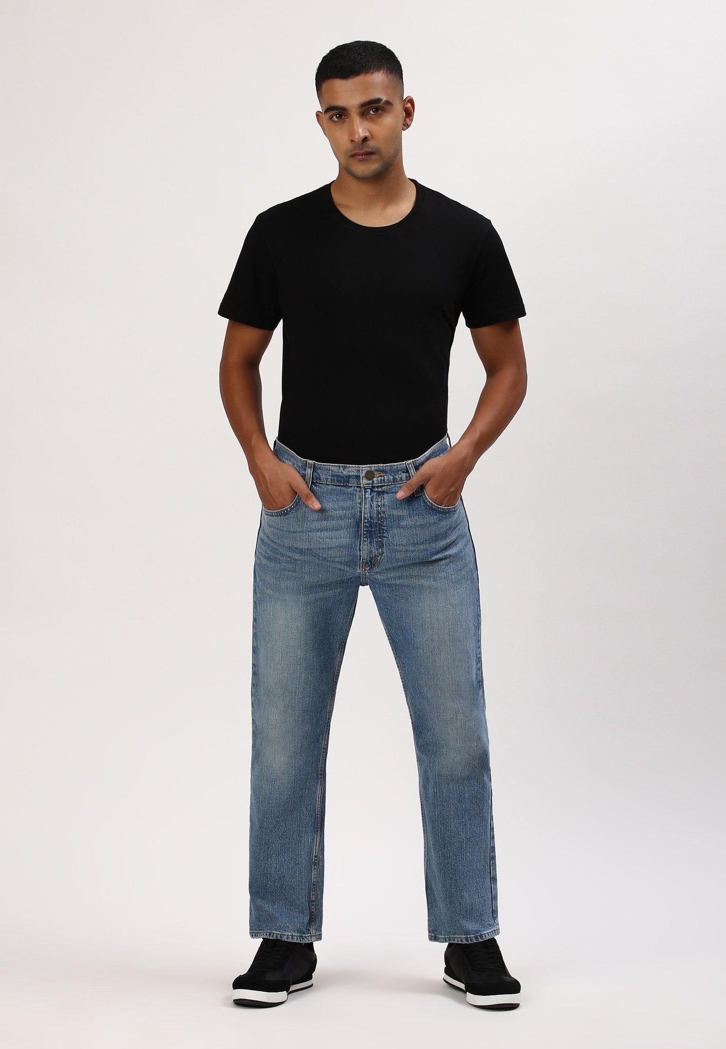 Mid Indigo Mid Rise Bootcut Jeans