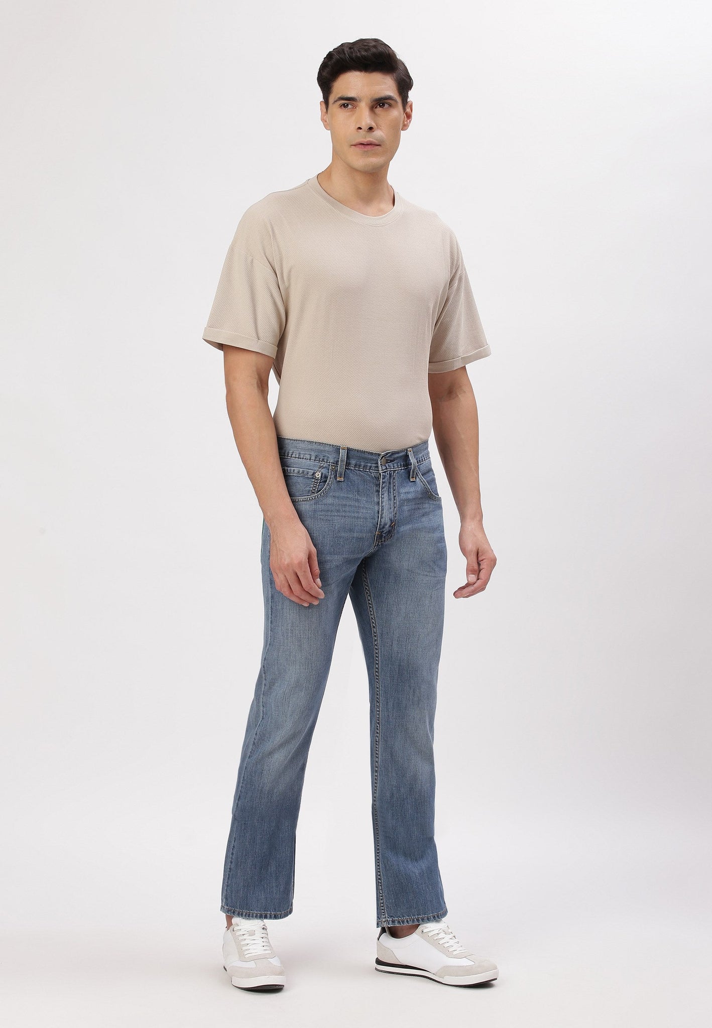 Mid Indigo Mid Rise Bootcut Jeans